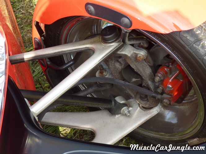 https://www.musclecarjungle.com/pictures/plymouth/prowler/orange-prowler-front-suspension.jpg
